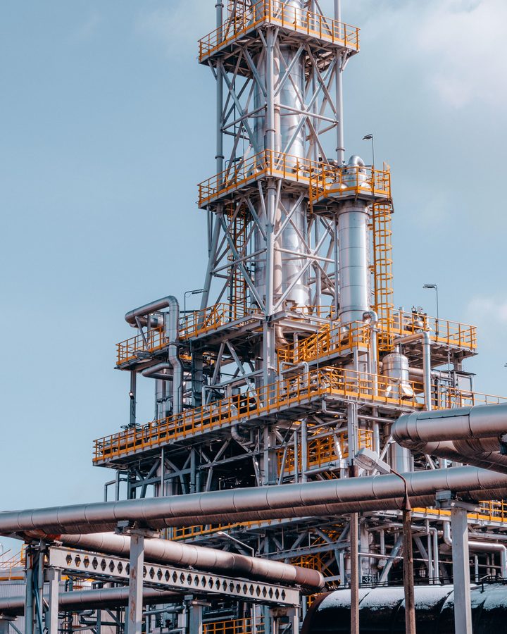 Process towers and pipework at an oil and gas facility