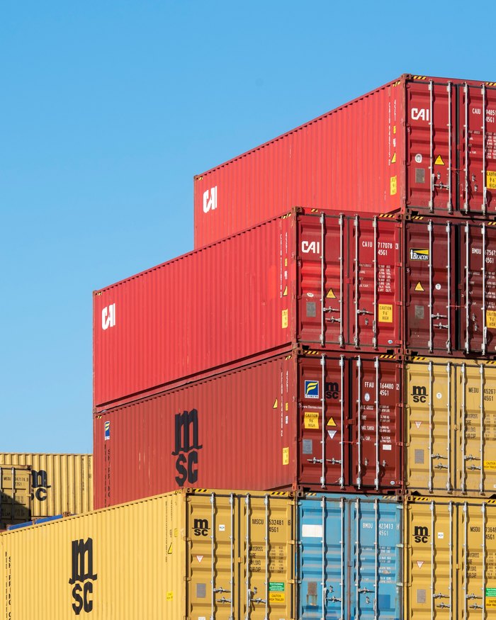 Stacked shipping containers at a freight terminal