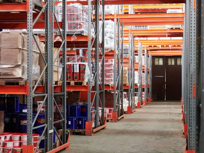 Racked industrial warehouse stocked with supplier inventory